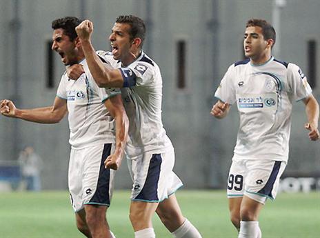 הפלייאוף מחכה להם. שחקני רמה"ש חוגגים (צילום: אלן שיבר)