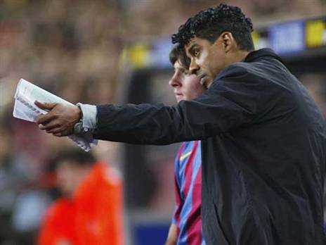 רייקארד עם מסי. אחרי עונה חלשה, הוחלף במאמן הצעיר של ברצלונה ב' (Getty)