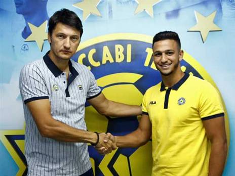 אלמוג עם איביץ' (באדיבות מכבי תל אביב, האתר הרשמי)