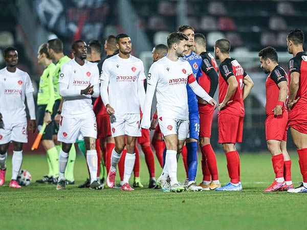 שחקני הפועל. קלינגר בטוח שהיו הידבקויות (מאור אלקסלסי)