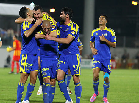 האם אלה התמונות שנראה גם בעוד 19 דקות? שחקני מכבי חוגגים (צילום: לירון מולדובן)