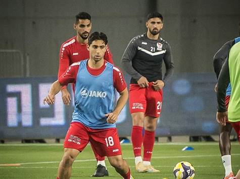 שחקני סכנין בחימום (עודד קרני)